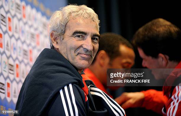 France national football team's coach Raymond Domenech smiles before a press conference, on October 9, 2009 in Perros-Guirec, western France, on the...
