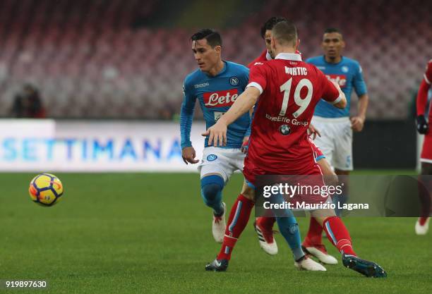 Josè Maria Callejon of Napoli competes for the ball with Jasmin Kurtic of Spal during the serie A match between SSC Napoli and Spal at Stadio San...