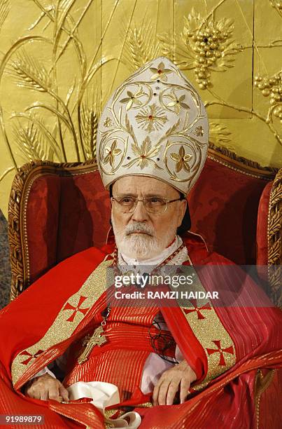 Lebanese Maronite Patriarch Cardinal Nasrallah Boutros Sfeir attends a mass wedding at the cathedral in Harissa, north of Beirut, on October 16,...