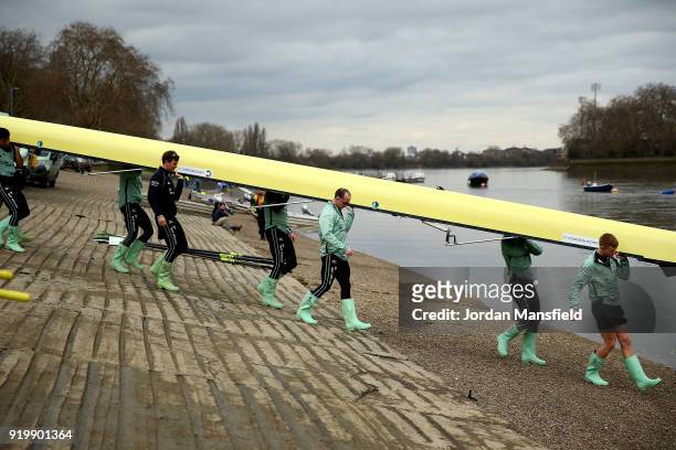 The Cambridge Goldie Crew prepare their boat during the Boat Race Trial Race between Cambridge University Boat Club and University of London on...
