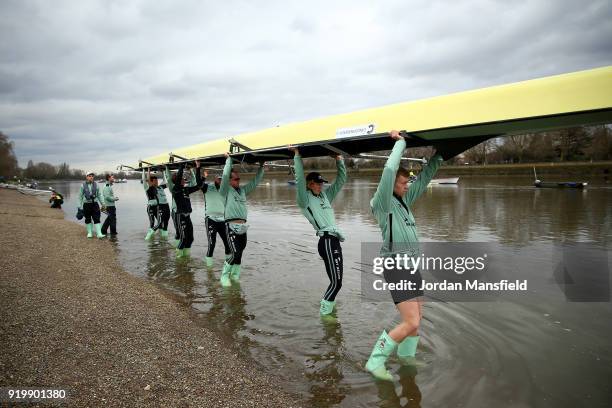 The Cambridge Goldie Crew prepare their boat during the Boat Race Trial Race between Cambridge University Boat Club and University of London on...