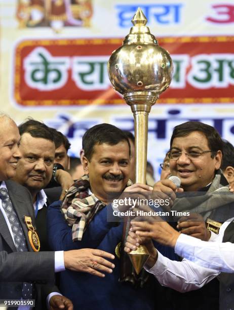 Rajya Sabha Member Sushil Gupta and others facilitate Delhi CM Arvind Kejriwal during a function at Indira Gandhi stadium, on February 18, 2018 in...