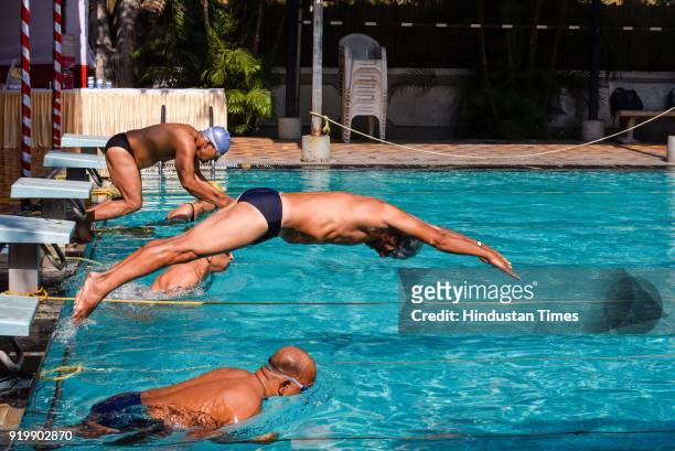 Contestants of Swimathon in action at swimming pool at Balgandharva Rangamandir, on February 17, 2018 in Pune, India. Swimathon organised by Champion...