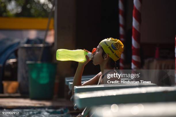 Contestants of Swimathon in action at swimming pool at Balgandharva Rangamandir, on February 17, 2018 in Pune, India. Swimathon organised by Champion...