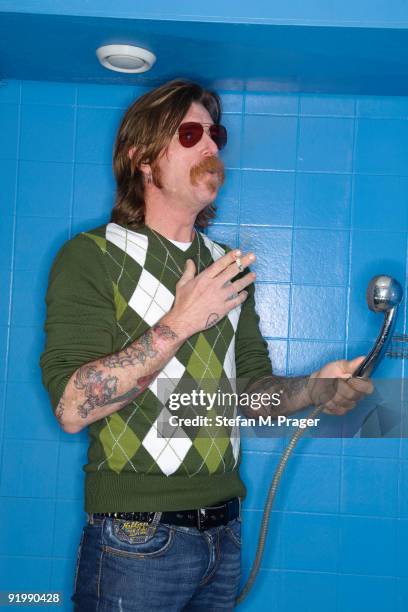 Jesse "Electric Boots" Hughes poses Backstage at Muffathalle on October 18, 2009 in Munich, Germany.