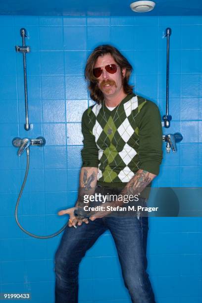 Jesse "Electric Boots" Hughes poses Backstage at Muffathalle on October 18, 2009 in Munich, Germany.