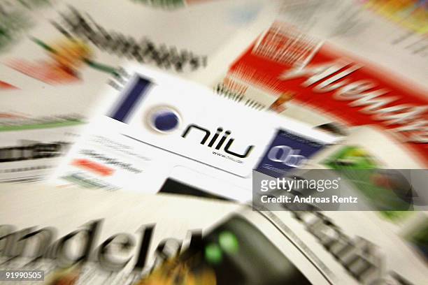 In this photo illustration the world's first individualised newspaper Niiu is pictured among the participating newspapers on October 19, 2009 in...