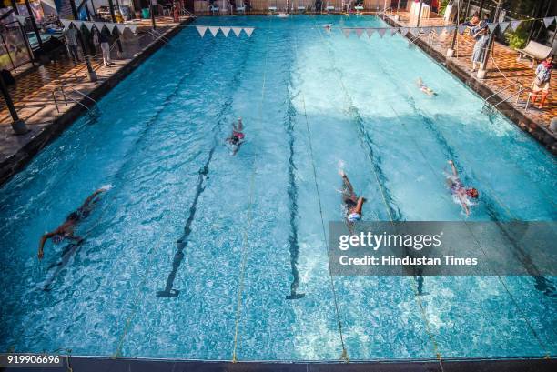 Contestants of Swimathon in action at swimming pool at Balgandharva Rangamandir, on February 17, 2018 in Pune, India. Swimathon organised by Champion...