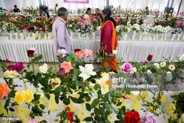 People visit at 101 Roses exhibition organised by The Rose Society of Pune at Tilak Smarak Mandir on Tilak road, on February 17, 2018 in Pune, India.