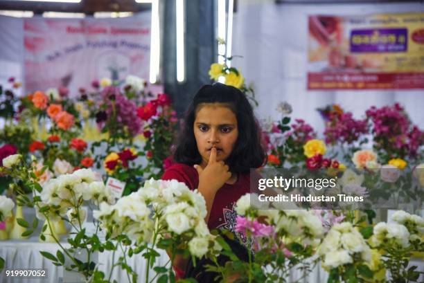 People visit at 101 Roses exhibition organised by The Rose Society of Pune at Tilak Smarak Mandir on Tilak road, on February 17, 2018 in Pune, India.