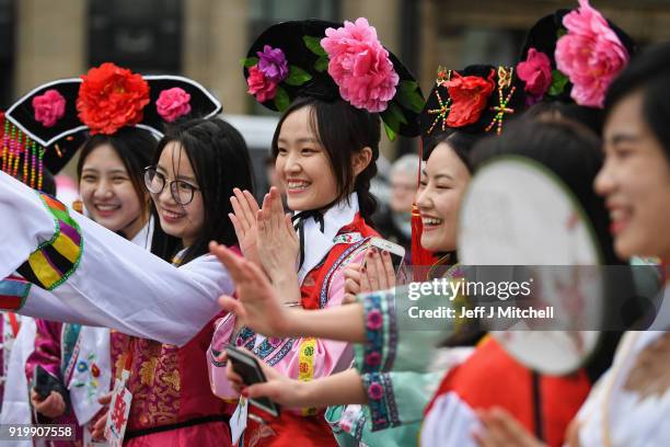 The Chinese community in Glasgow celebrate during Lunar New Year celebrations for the Year of the Dog at George Square on February 18, 2018 in...