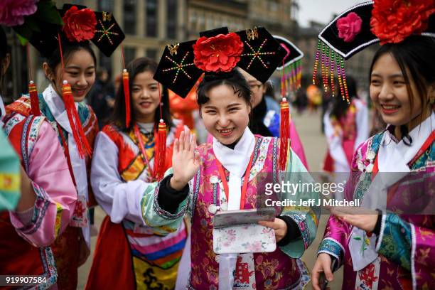 The Chinese community gather in Glasgow celebrate during Lunar New Year celebrations for the Year of the Dog at George Square on February 18, 2018 in...