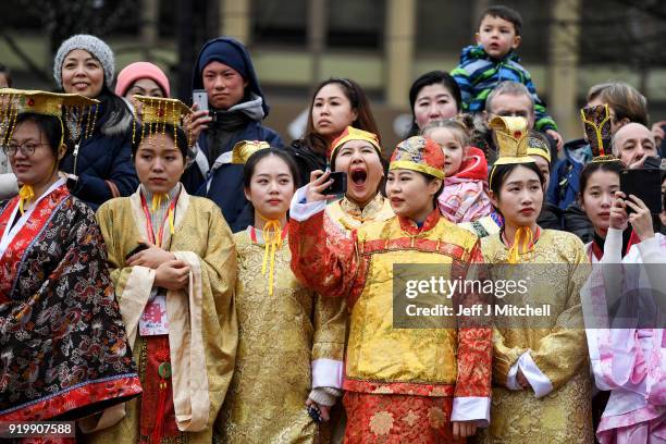 The Chinese community gather in Glasgow celebrate during Lunar New Year celebrations for the Year of the Dog at George Square on February 18, 2018 in...