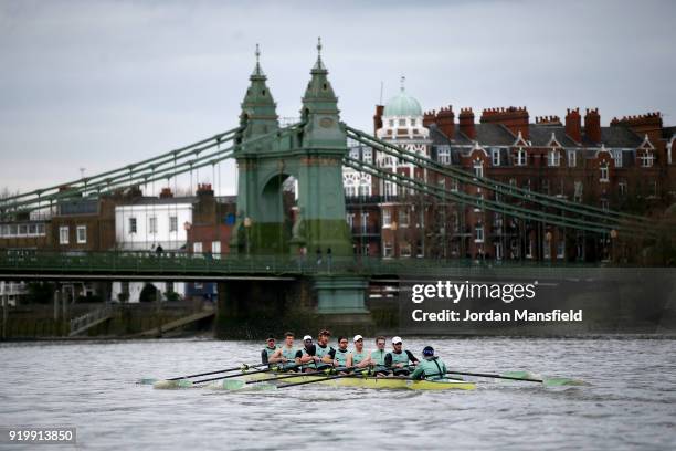 The Cambridge University Boat Club pass under Hammersmith Bridge during the Boat Race Trial race between Cambridge University Boat Club and...