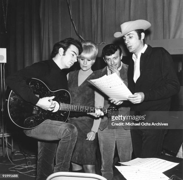 Singer Neil Diamond and songwriters and producers Ellie Greenwich, Bert Berns and Jeff Barry work up a tune in circa 1966.