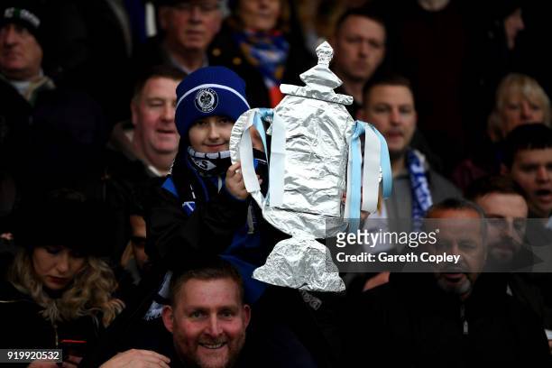 Fan holds a home made FA cup during The Emirates FA Cup Fifth Round match between Rochdale and Tottenham Hotspur on February 18, 2018 in Rochdale,...