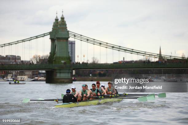 The Cambridge University Boat Club passes under Hammersmith Bridge during the Boat Race Trial race between Cambridge University Boat Club and...