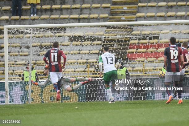 The ball kicked by Erik Pulgar of Bologna FC goes past Andrea Consigli goalkeeper of US Sassuolo during the serie A match between Bologna FC and US...