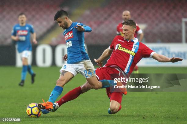 Lorenzo Insigne of Napoli competes for the ball with Bartosz Salamon of Spal during the serie A match between SSC Napoli and Spal at Stadio San Paolo...