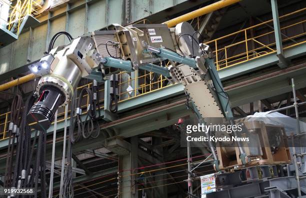 Photo taken Feb. 7, 2018 in Kobe, Japan, shows a large robot arm produced by Mitsubishi Heavy Industries Ltd. And the International Research...
