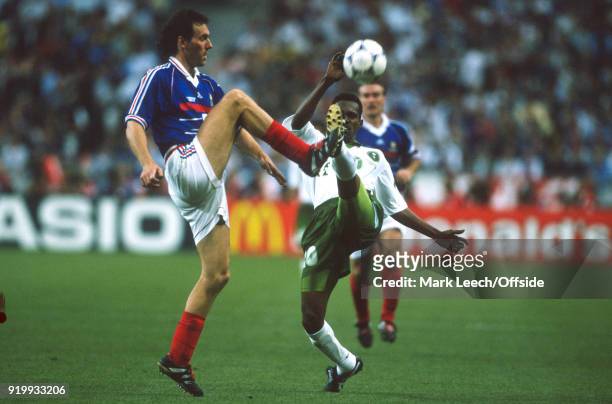 June 1998 - World Cup 1998 Football - France v Saudi Arabia - Laurent Blanc of France makes a tackle to win the ball from Hamza Saleh of Saudi Arabia...