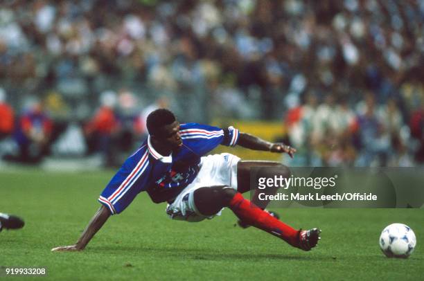 June 1998 - World Cup 1998 Football - France v Saudi Arabia - Marcel Desailly of France winning the ball in a tackle .