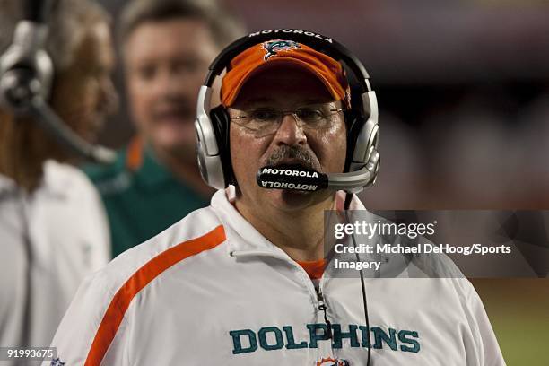 Head Coach Tony Sparano of the Miami Dolphins carries the ball during an NFL game against the New York Jets at Land Shark Stadium on October 12, 2009...