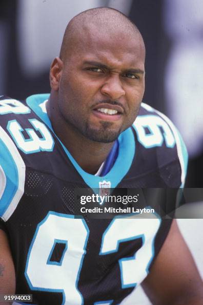 Mike Rucker of the Carolina Panthers looks on during an NFL football ...