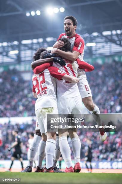 Michael Gregoritsch of Augsburg celebrates a disallowed goal with his team mates during the Bundesliga match between FC Augsburg and VfB Stuttgart at...