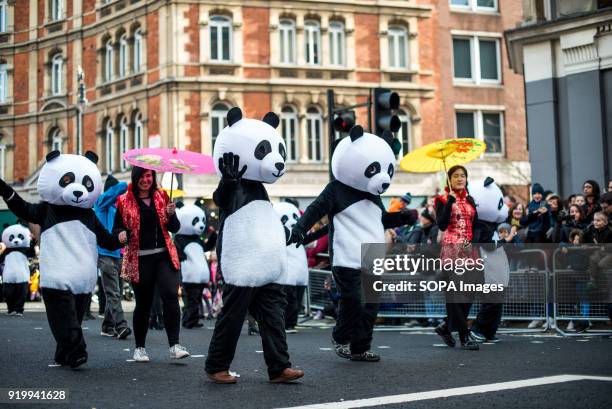 Several panda characters seen on the Chinatown streets during the Chinese New Year celebration. Chinese London community celebrate the Year of the...