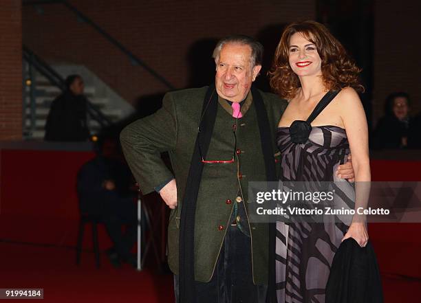 Director Tinto Brass and Caterina Varzi attend the 'Christine, Cristina' Premiere during day 5 of the 4th Rome International Film Festival held at...