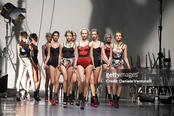 Models walk down the runway during the Dolce & Gabbana show as part of Milan Womenswear Fashion Week Spring/Summer 2010 on September 27, 2009 in...