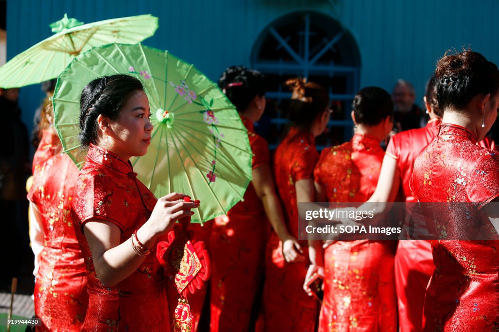 Women seen wearing traditional Chinese clothes during the...