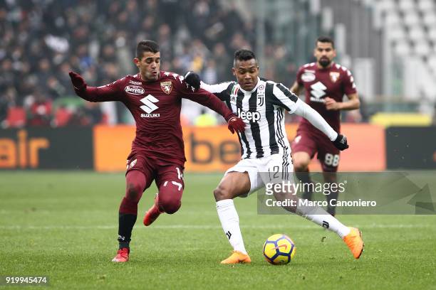 Iago Falque of Torino FC and Alex Sandro of Juventus Fc in action during the Serie A football match between Torino Fc and Juventus Fc. Juventus Fc...