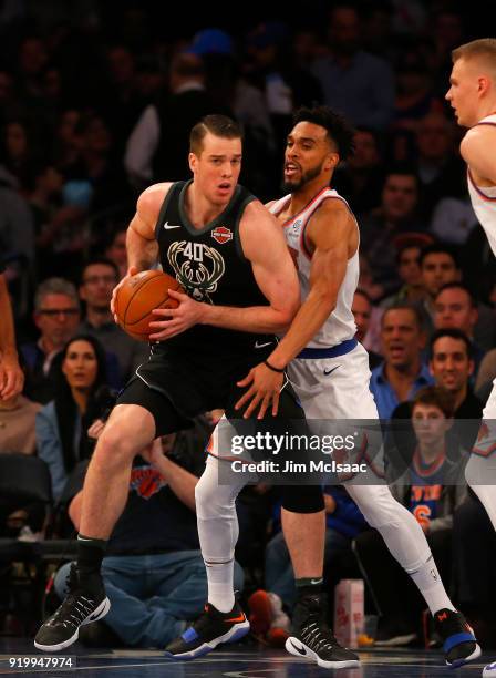 Marshall Plumlee of the Milwaukee Bucks in action against Courtney Lee of the New York Knicks at Madison Square Garden on February 6, 2018 in New...