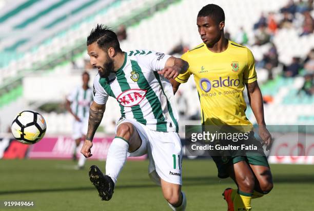 Vitoria Setubal midfielder Joao Costinha from Portugal with FC Pacos de Ferreira defender Paulo Henrique from Portugal in action during the Primeira...
