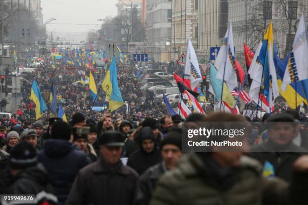 Few thousands of protesters and supporters of the former Georgian president and ex-Odessa Governor Mikheil Saakashvili march downtown Kyiv demanding...