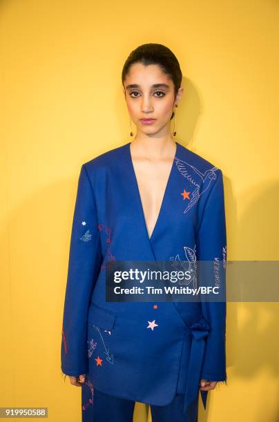 Model backstage ahead of the Roberta Einer presentation during London Fashion Week February 2018 at The Law Society on February 18, 2018 in London,...