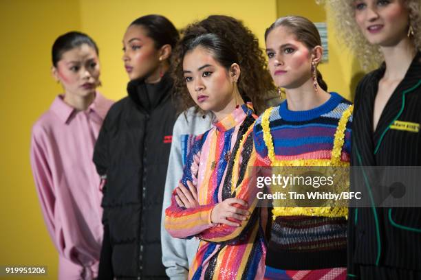 Models backstage ahead of the Roberta Einer presentation during London Fashion Week February 2018 at The Law Society on February 18, 2018 in London,...