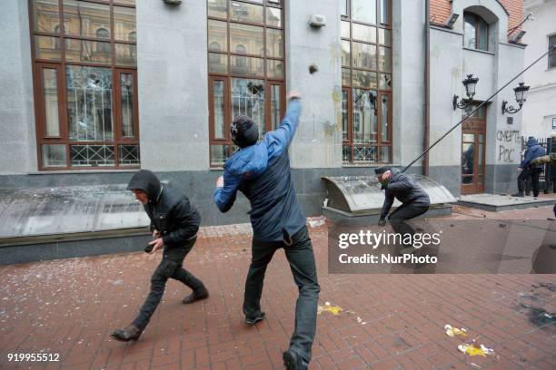 Right-wing activists threw stones and eggs at the window of the Russian Center of Science and Culture during their rally in Kiev, Ukraine, on...