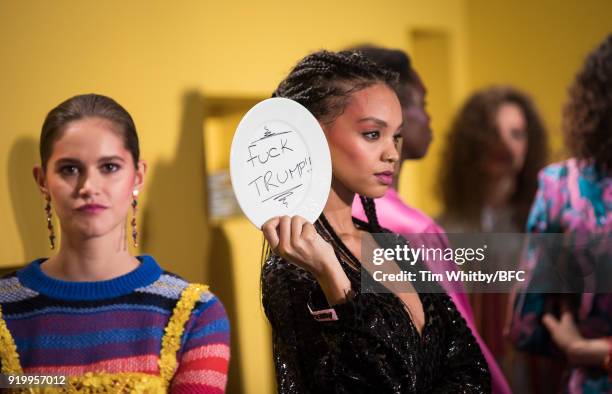 Model backstage ahead of the Roberta Einer presentation during London Fashion Week February 2018 at The Law Society on February 18, 2018 in London,...