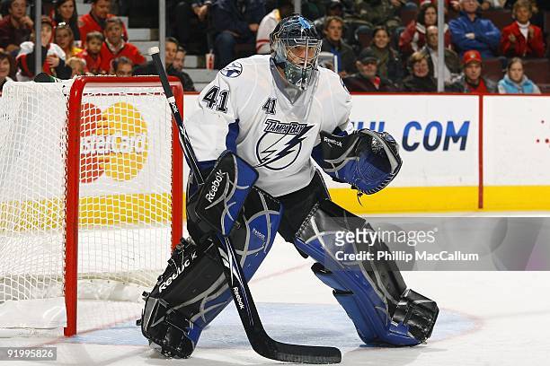 Goalie Mike Smith of the Tampa Bay Lightning follows the puck against the Ottawa Senators during a game at Scotiabank Place on October 15, 2009 in...