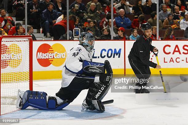 Goalie Mike Smith of the Tampa Bay Lightning stretches on the ice against the Ottawa Senators during a game at Scotiabank Place on October 15, 2009...