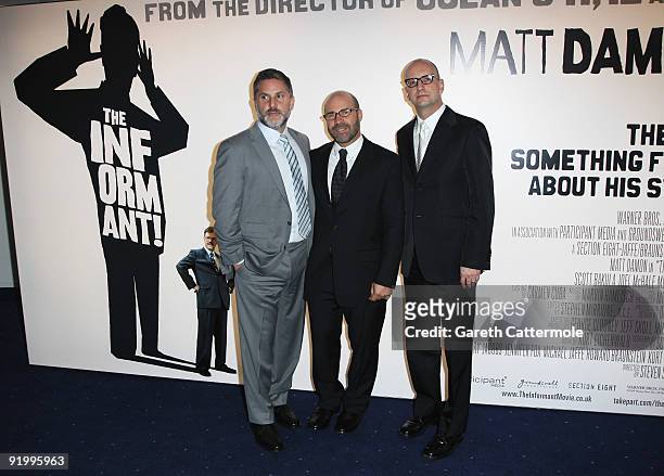 Director Steven Soderbergh, screenwriter Scott Burns and producer Gregory Jacobs arrive for the premiere of 'The Informant!' during the Times BFI...