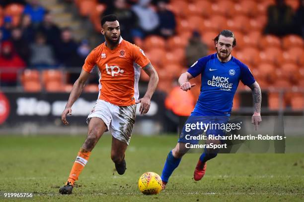 Blackpool's Curtis Tilt competes with Peterborough United's Jack Marriott during the Sky Bet League One match between Blackpool and Peterborough...