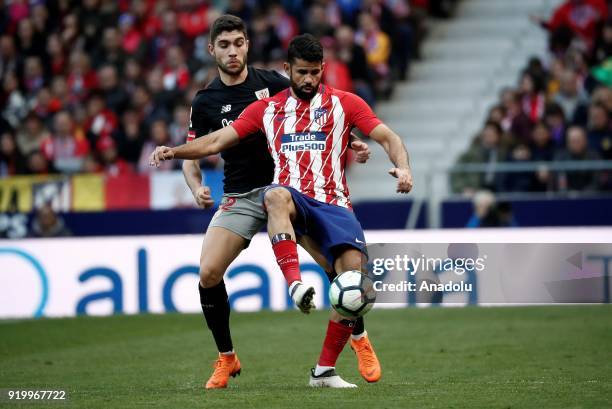 Diego Costa of Atletico Madrid in action against Unai Nunez of Athletic Club Bilbao during a La Liga week 24 match between Atletico Madrid and...