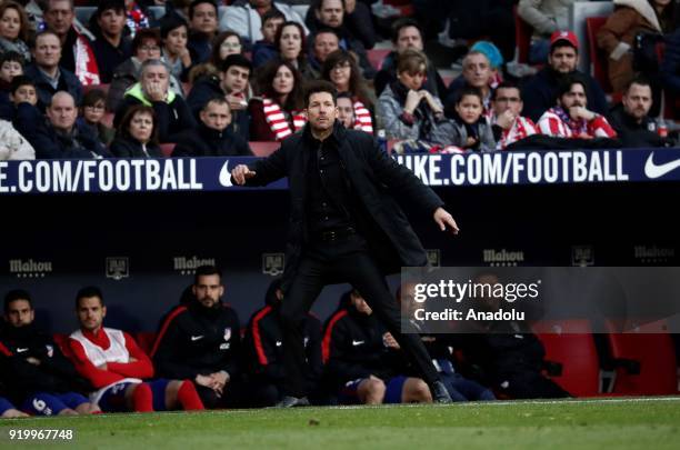 Head coach Diego Simeone of Atletico Madrid looks on from the substitutes' bench during a La Liga week 24 match between Atletico Madrid and Athletic...