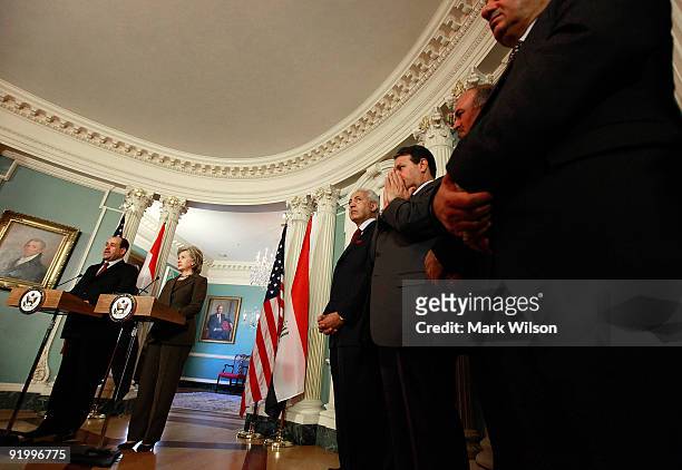 Secretary of State Hillary Clinton and Prime Minister of Iraq Nouri al-Maliki talk to reporters after a meeting at the State Department on October...