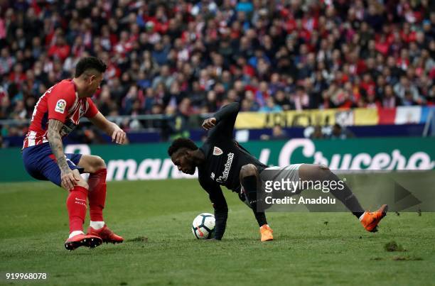 Jose Gimenez of Atletico Madrid in action against Inaki Williams of Athletic Club Bilbao during a La Liga week 24 match between Atletico Madrid and...