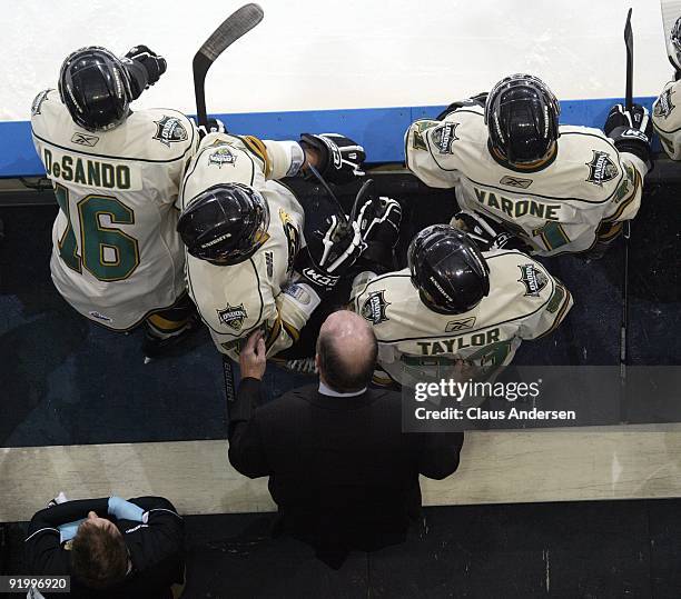 Mark Hunter of the London Knights talks to his players on the bench during a game against the Barrie Colts on October 16, 2009 at the John Labatt...